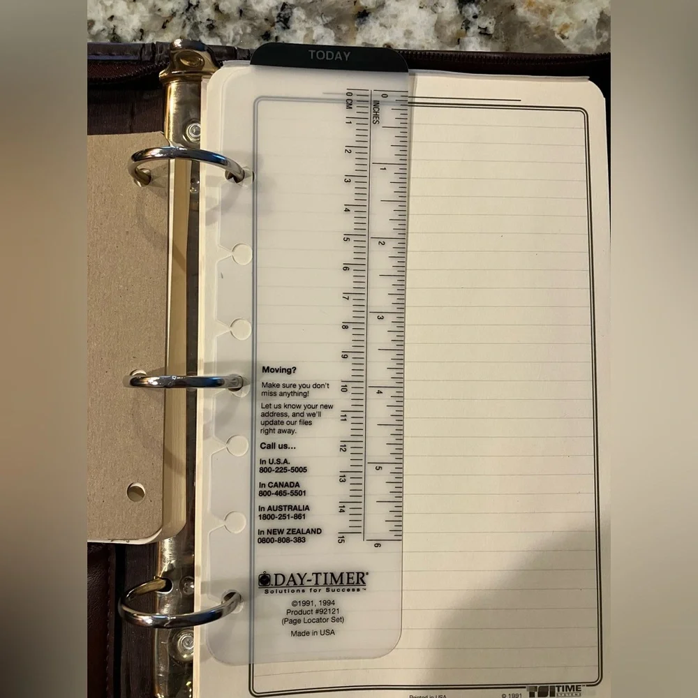 3-Ring Day-Timer planner binder with zipper closure